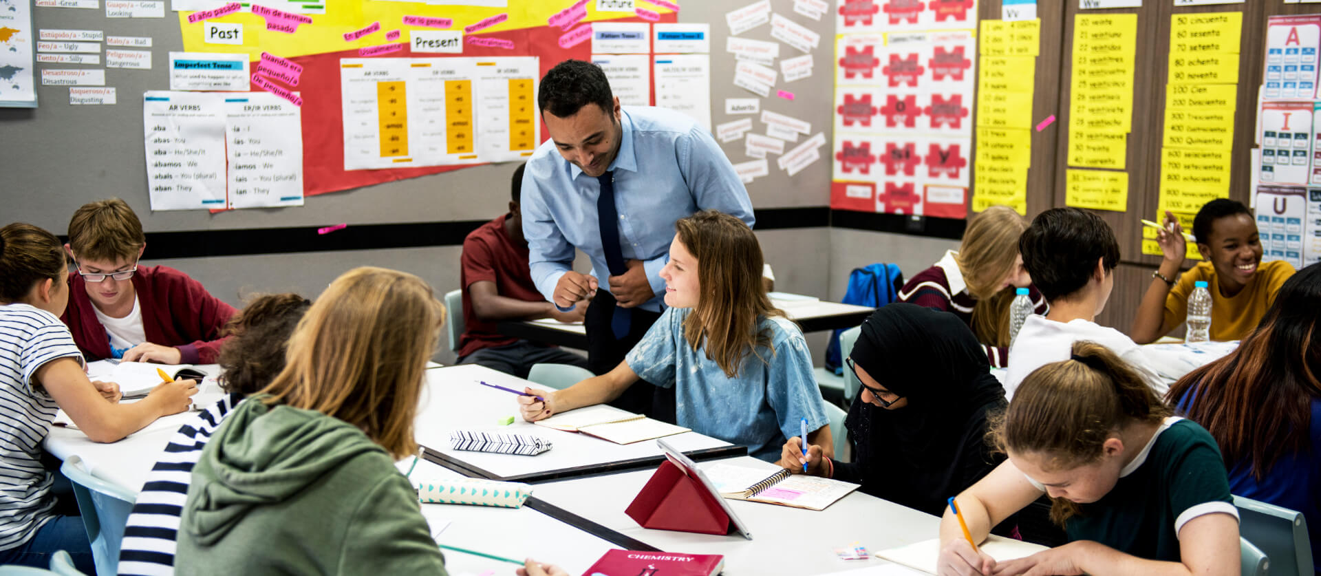 School teacher with students in a clasroom